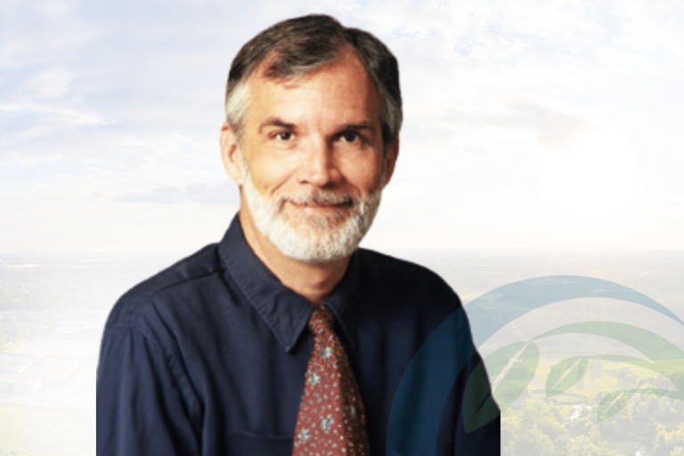Photo of Robin Scott Fisher, a distinguished UCLA neuroscientist, against a backdrop of blue sky.